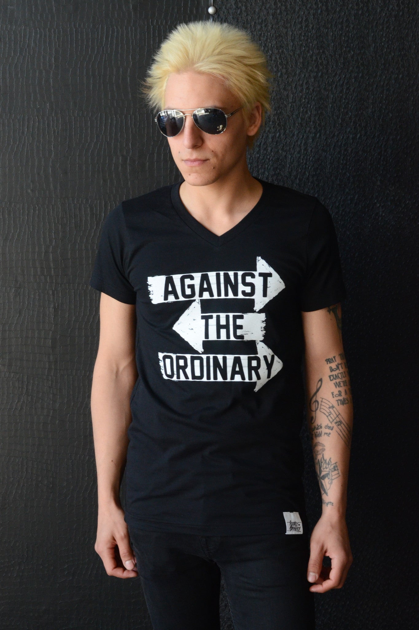 AGAINST THE ORDINARY Men's Short Sleeved V Neck Tee with ARROW Graphic